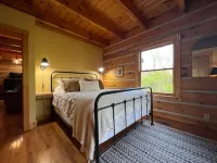 Unique Log Cabin Retreat on 138 Acres, swim, fish, boat, paddleboard, kayak!