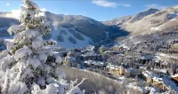 1 min. walk to slopes!Mountain view! Steps to ski lift/gondola, shops & dining!