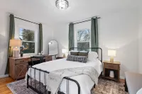 Urban Oasis: A Charming Downtown Retreat with Game Room, Firepit and Yard Games