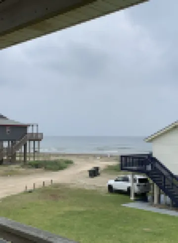 Beach viewing from deck, living, dining, kitchen, in your king size Nectar bed.