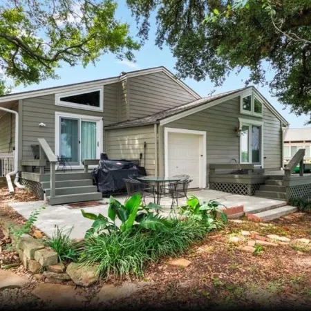 Quaint, Cozy, Lakefront Haven w/ Lily Pad, Kayaks, Firepit, and Wrap Around Deck