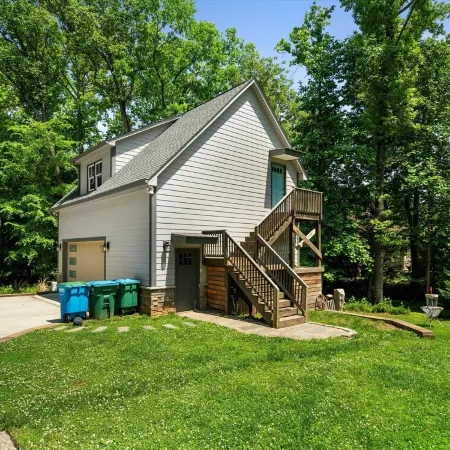 Studio above a detached garage away from main house on a private lot.