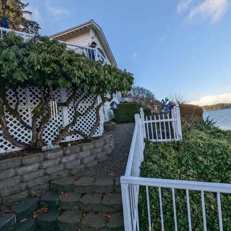 Waterfront Villa with Private Beach, Hot tub, EV & WFH