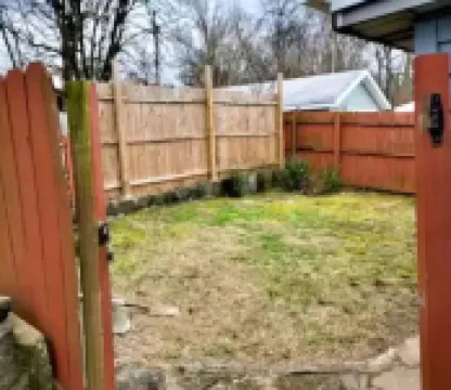 Pet friendly house with 3 king beds and fenced in back yard.