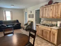 Beautiful 4 unit lodge w/ Hot tub, WiFi, fire pits &  pavilion area with grills