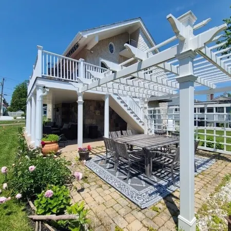 Beach House steps to private beaches in sought after location!