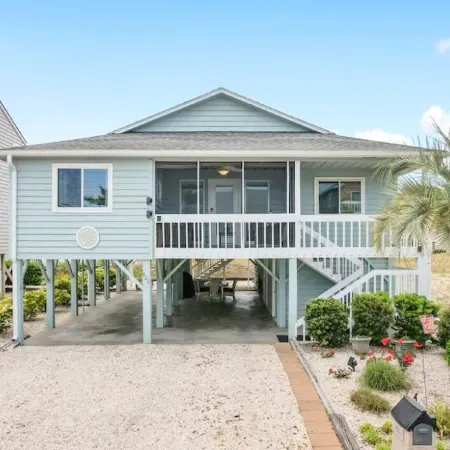 Updated Sunset Beach Home w/ a 2-Minute Walk to the Beach.  Parking for 5 Cars.