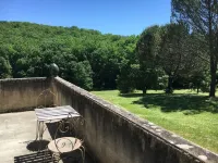 Old house in lush greenery on the road to St Cirq Lapopie Hotels near Maison du 15e siècle