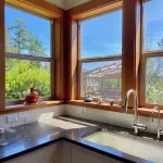 Bright art-filled home, fruit trees, valley view