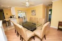 Fun Magical Home on Canal-Relaxing Pool -Spa-Enjoy Fishing-Kayaks-WiFi-Near All