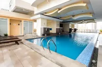 Pacific Bay Grand Suites - piscina