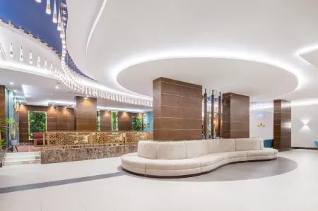 Roots Hotel Отели рядом с достопримечательностью «King Abdullah Library»