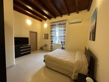 In Centro Rooms and Apartments Отели в г. Бовилле-Эрника