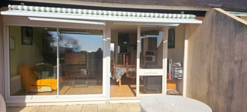 Apartment with beautiful view over a wooded park and a large terrace