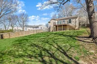 Stylish Kitchen and Expansive Outdoor Deck - Charming Fayetteville Haven Hotels near Bud Walton Arena