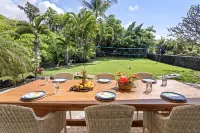 Tropical Oasis with Sparkling Pool and Outdoor Fun - Elegant Retreat