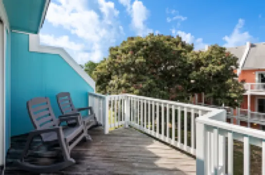 Community Pool and Covered Deck - Charming Coastal Haven