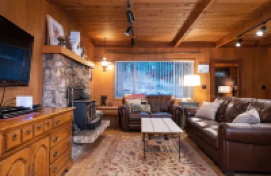 Spacious Deck and Cozy Living Area - Charming Mountain Retreat