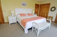 Majestic Sunsets and Soundfront Access - Beautiful Coastal Retreat