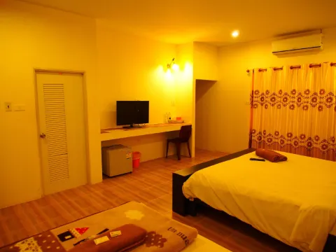 ห้องพักสำหรับสามท่านพร้อมวิวสวน