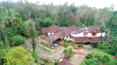 Unlock by Goldfinch Sakaleshpur Отели в г. Хассан