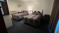 Four Oaks Lodging - Parkplatz