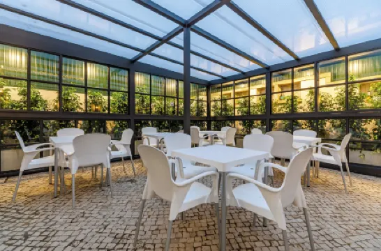 阿維尼達園公寓酒店