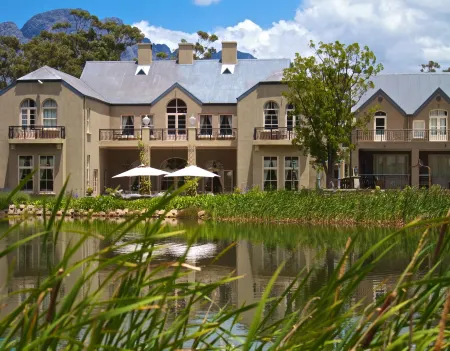 L'Ermitage - Franschhoek Chateau & Villas Отели в г. Фрэншек