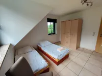 Spacious Semi Detached House with Wood Stove Located Directly on the Rennsteig Hotels in Sachsenbrunn