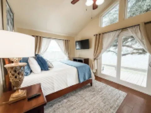 Quaint, Cozy, Lakefront Haven w/ Lily Pad, Kayaks, Firepit, and Wrap Around Deck