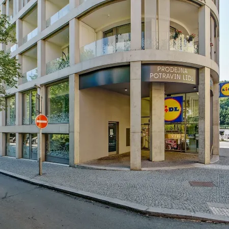 Kora Apartments Отели рядом с Аэропорт Вацлав Гавел