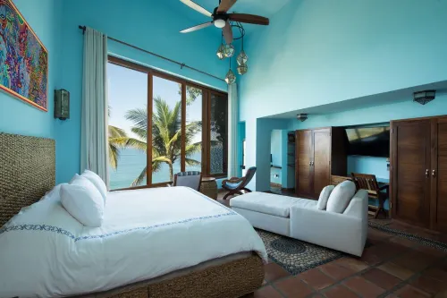 Beachfront Steps from Romantic Zone: Casa Cuatro Abrazos (Upper Half)