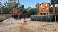 Amazing Jungle Tree House right over the river with bikes and canoe