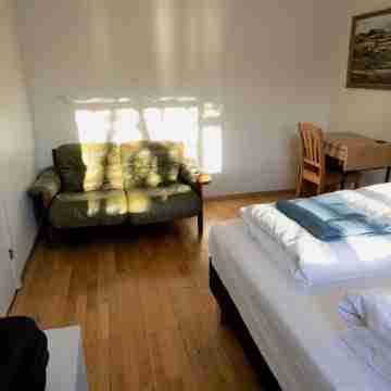 Four double beds down-town main street. Rooms
