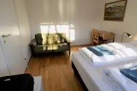 Four double beds down-town main street.