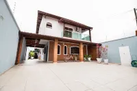 Best location in Caraguá with pool - 5 bedrooms - Up to 20 people Hotels near Cocanha Beach