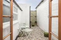 Just one row back from the beach; sea view; family & dog friendly