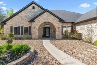 Lakefront Granbury Home, Sleeps 16, Hot Tub, Dock w/Lift, Jet Ski, & Fishing