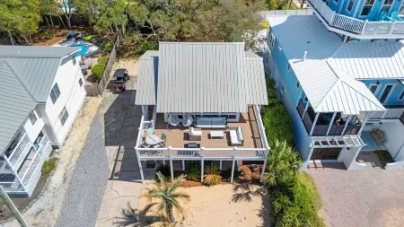 Beach Retreat w/ Sundeck, Golf Cart & Bikes Bungalow House by Avantstay