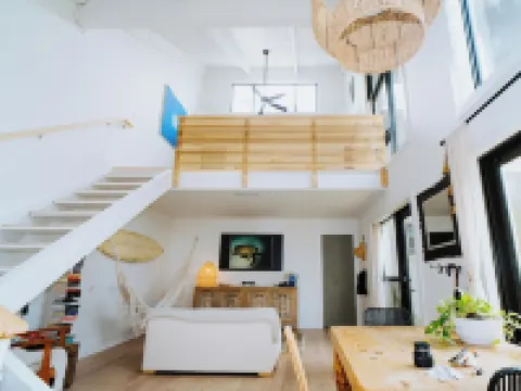 Walk to the Beach! Boho-Inspired 2BR Jupiter Loft w Private Outdoor Space