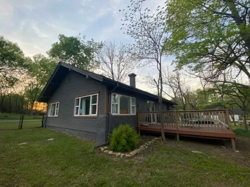 Monkey Island Escape sleeps 8, surrounded by nature with views of Grand Lake.