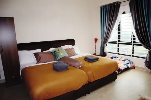 AIMIN HOMESTAYCozy studio in peaceful Cyberjaya with WiFi, AC, fitness room