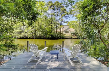 Lagoon-Front Retreat w/ Pool, Spa, Game Room & Private Dock Short Walk to Beach