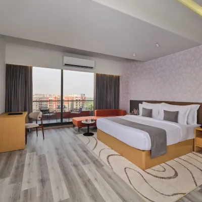 Pride Elite Gandhinagar Hotels near The Adalaj Stepwell