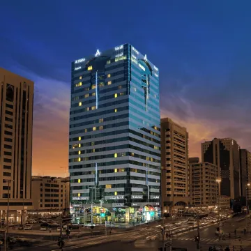 Al Maha Arjaan by Rotana Отели рядом с достопримечательностью «Торговый центр Liwa Centre»