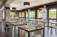 里爾圖爾寬貝斯特韋斯特SURE飯店 - 早餐