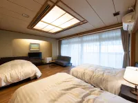 Garden Hotel Hanayo فنادق في كاميتوندا