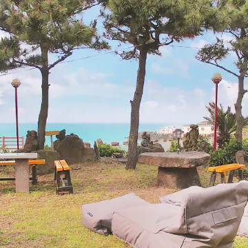 Jeju Orto Pension and Guest House Отели рядом с достопримечательностью «Храм Понвонса»