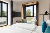 Vienna House by Wyndham MQ Kronberg Hotel dekat Burg Kronberg