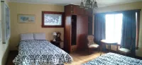 Vintage Island Home 2 Blocks From Town. 4 Bdrs, 2 Kitchens, 3 Bath. Can Sleep 14 Hotels in der Nähe von Palace Theater